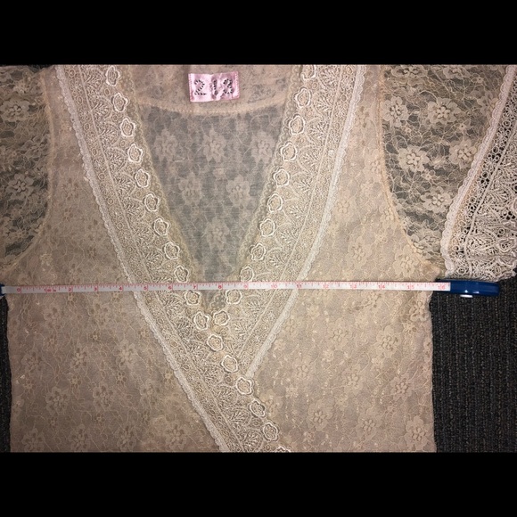 Super feminine lace wrap shirt. Hangs really well. - Picture 8 of 8